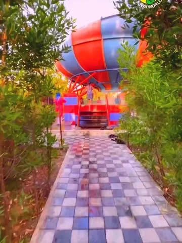 Landscaped approach to a water slide at Ajwa Water Park near Vadodara