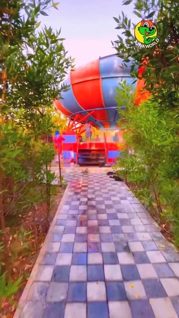 Landscaped approach to a water slide at Ajwa Water Park near Vadodara