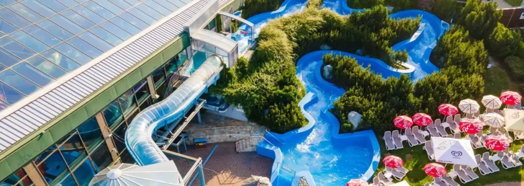 Outdoor river and water slide beside the Aquapalace Prague building