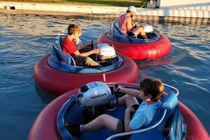 Families riding bumper boats at Burlington Go-Karts on Prince Edward Island