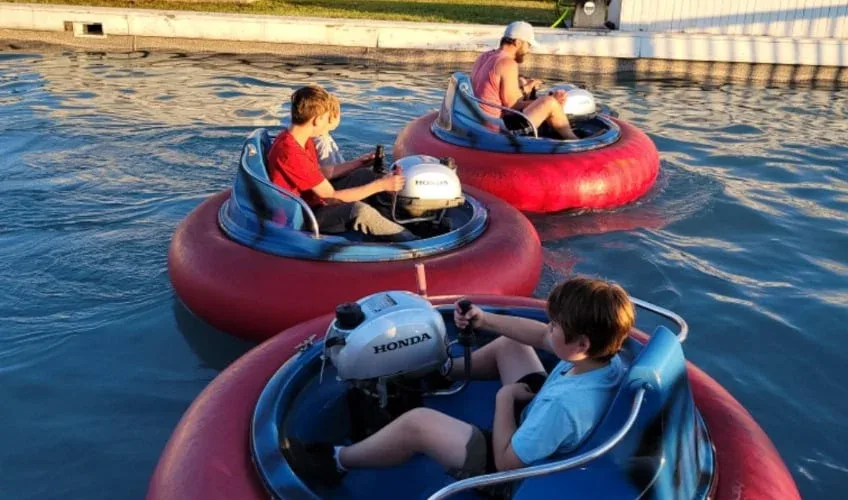 Families riding bumper boats at Burlington Go-Karts on Prince Edward Island