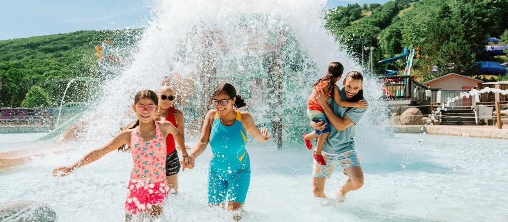 Families enjoying a splash area at Camelbeach Mountain Waterpark