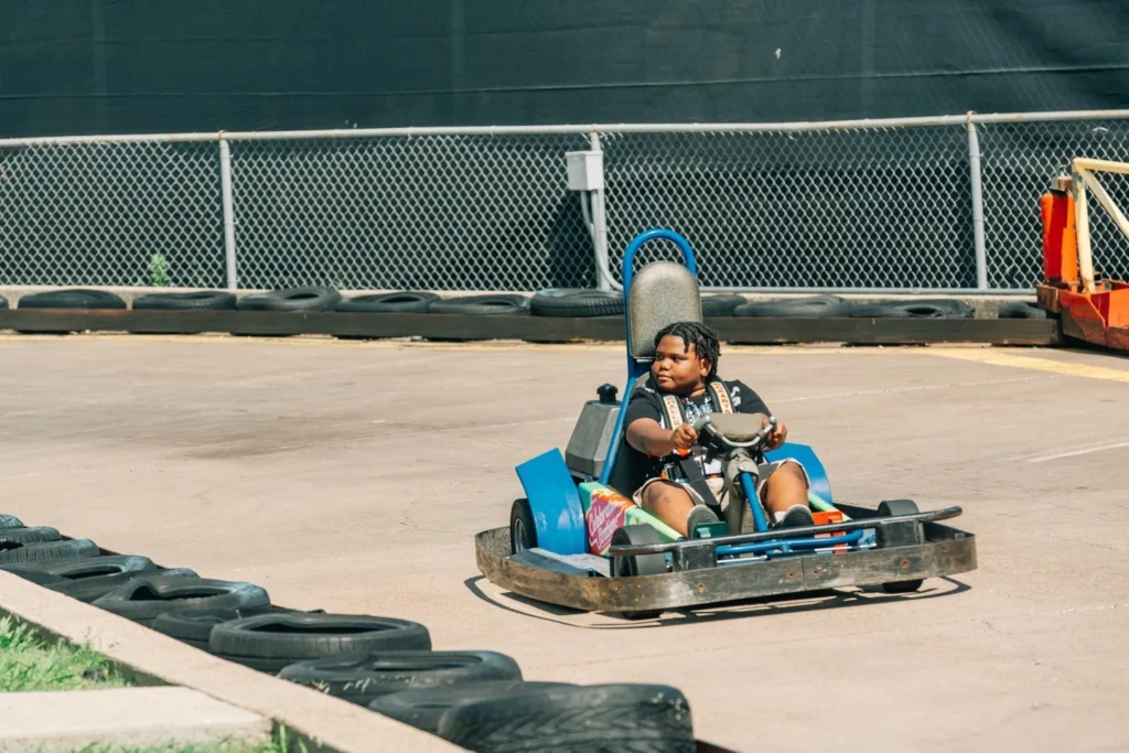 Go-kart racing in official Celebration Station brand photography