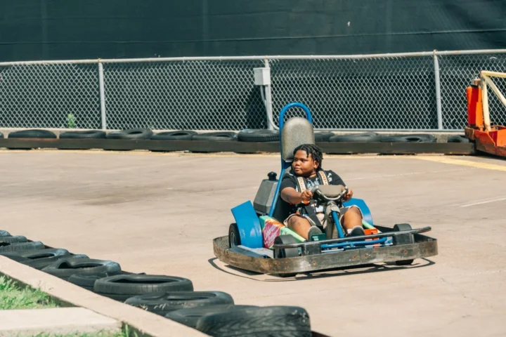 Go-kart racing in official Celebration Station brand photography