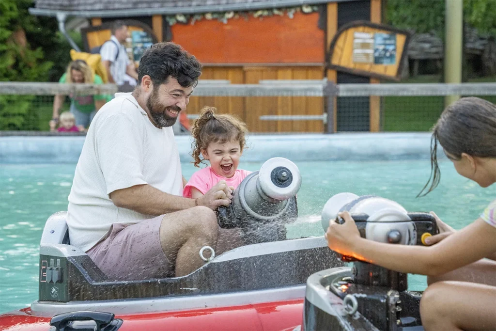 Family enjoying a water attraction at Cigoland