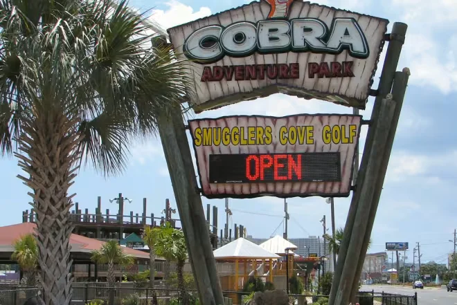 Cobra Adventure Park entrance sign and Smugglers’ Cove Golf in Panama City Beach