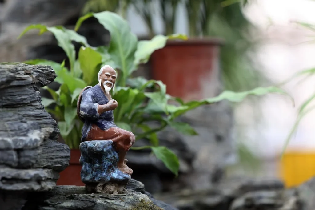 Garden ornament and greenery at Crab Island Resort in Beijing