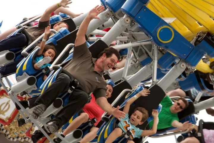 Father and child riding Freedom Flyer at Fun Spot America Orlando