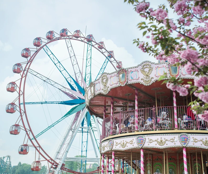 Ferris wheel and double-decker carousel at Happy Valley Chengdu