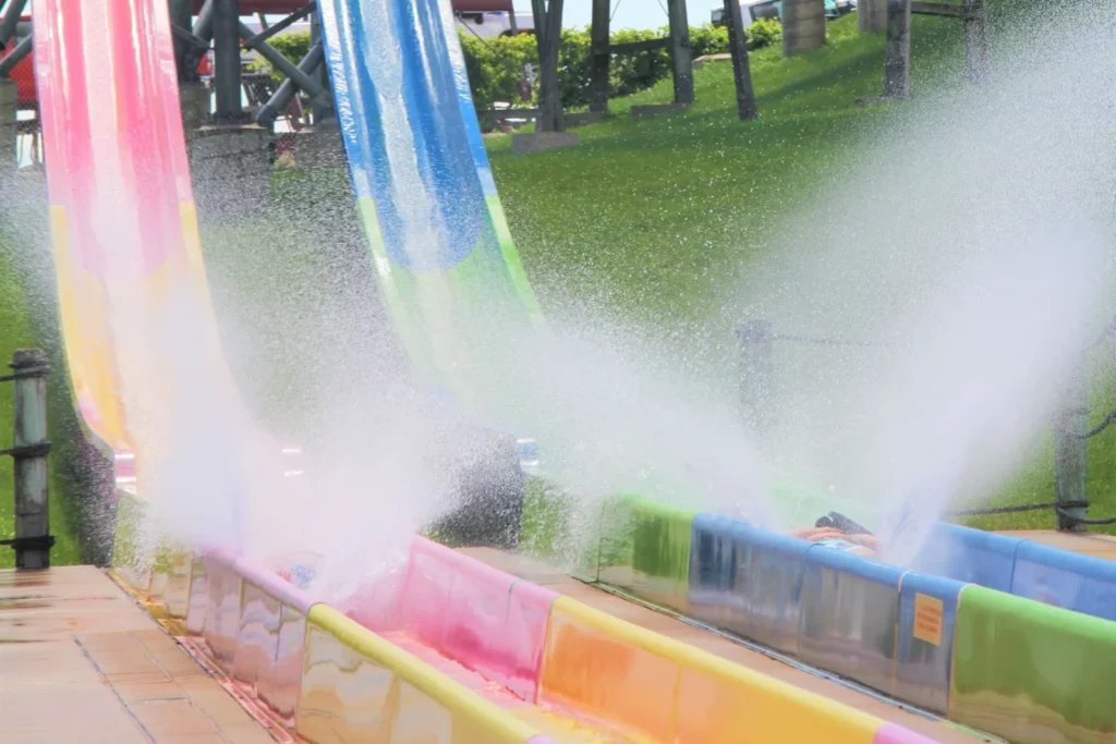 Guests on a water slide at Hurricane Harbor Rockford