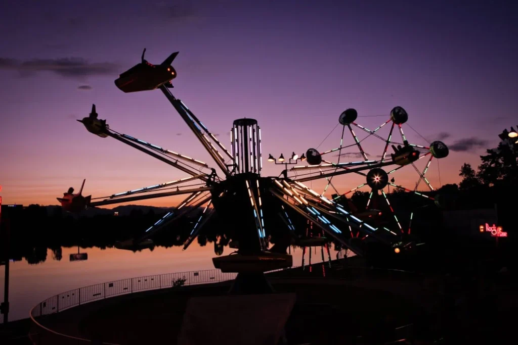 Satellite ride at sunset at Lakeside Amusement Park near Denver