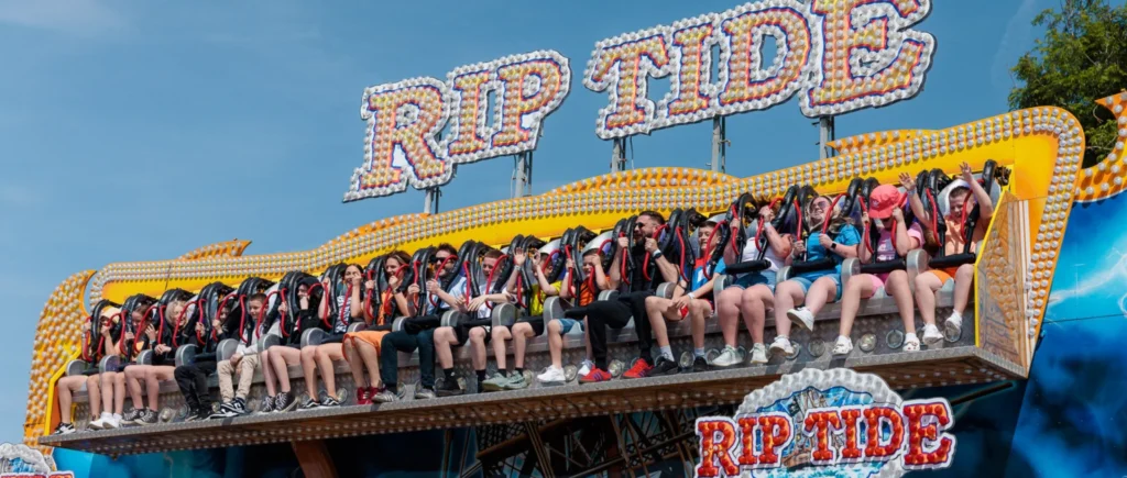 Guests riding Rip Tide at M&D’s theme park