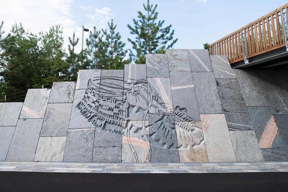 Stone ravine entrance and lakeside setting at Trillium Park in Toronto
