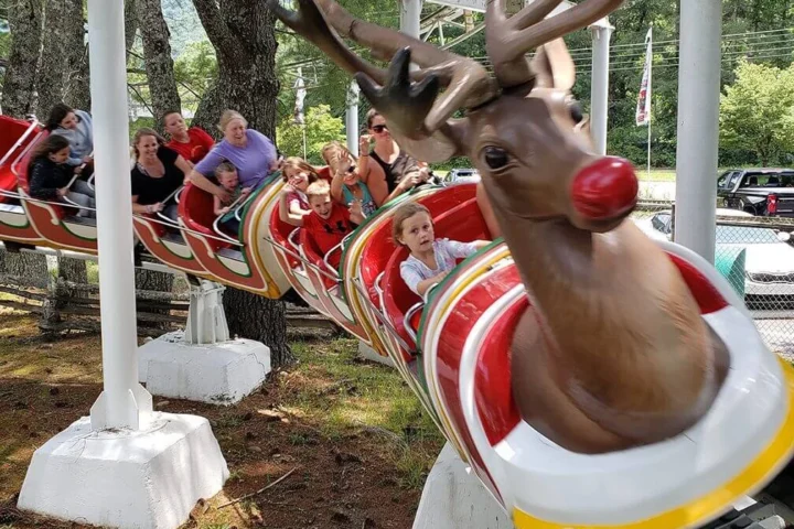 Family riding Rudicoaster at Santa’s Land in Cherokee