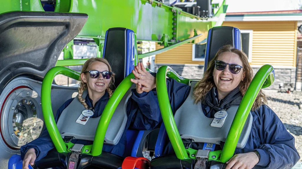 Guests riding a roller coaster at Six Flags New England