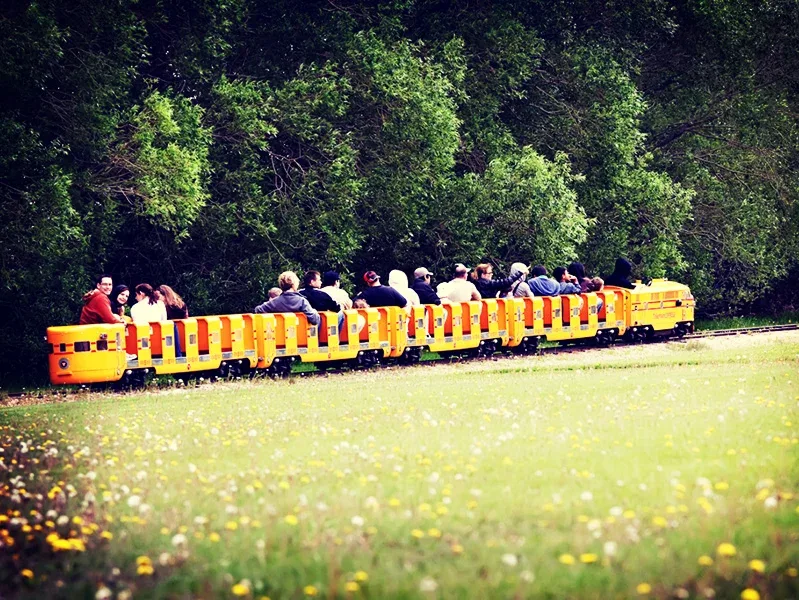 Passengers on the little yellow train at Tinkertown Amusements in Manitoba