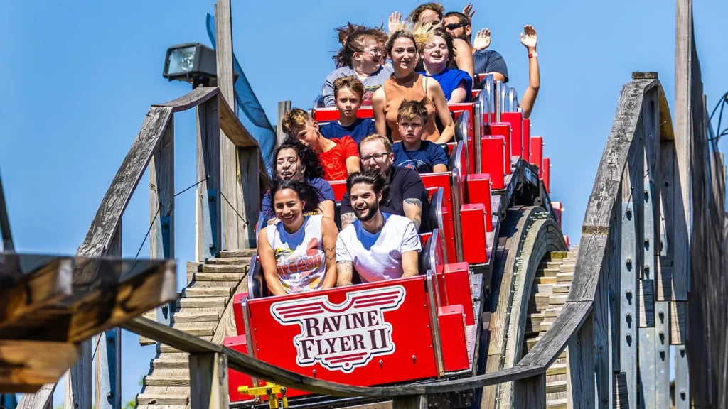 Passengers cresting a hill on Ravine Flyer II at Waldameer in Erie