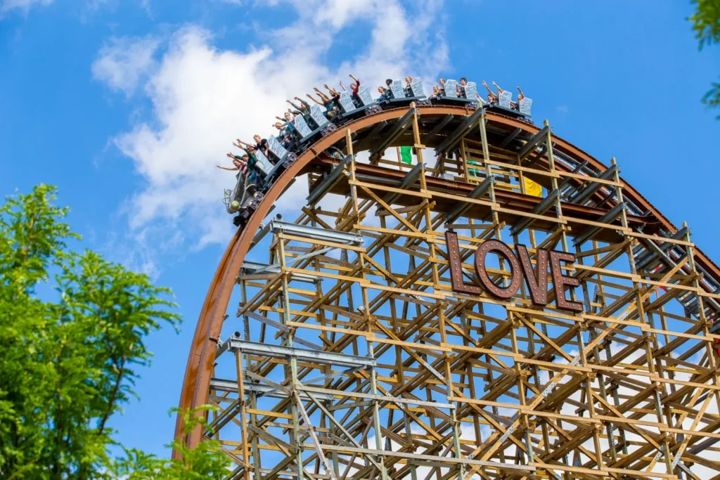 The Untamed coaster above its wooden support structure at Walibi Holland