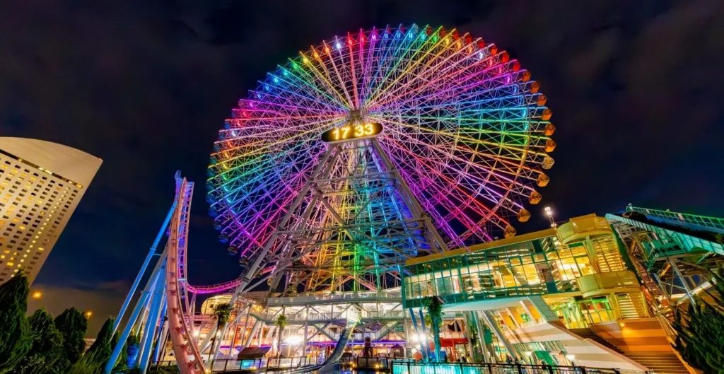 Cosmo Clock 21 illuminated at night at Yokohama Cosmo World